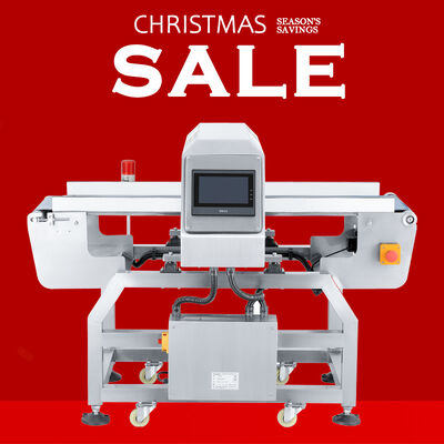 Detektor logam untuk aluminium foil kemasan conveyor belt di industri makanan.